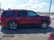 2011 Chevrolet Tahoe LTZ with VIN 1GNSKCE0XBR158736, listed as a IAAI auction lot 42355880 with 288,518 mi miles and . Bid and sale history available at DreamBid. Image 13.