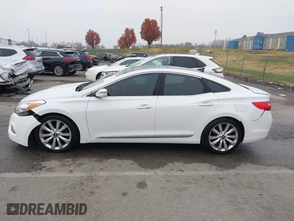 ✅ 2012 Hyundai Azera • VIN: KMHFH4JG8CA175421 • Лот: 43723586. Опубликован ранее на IAAI с пробегом 136 281 миль. Бесплатный доступ к архиву аукционных продаж из США и подробный отчёт об истории автомобиля на DreamBid. Изображение 14.