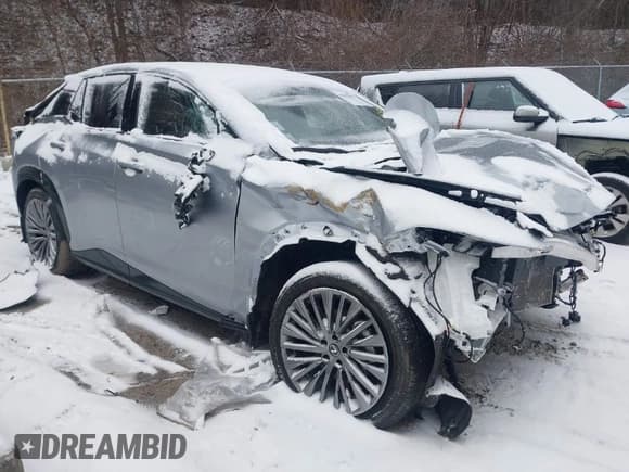 ✅ 2023 Lexus RZ 450e Premium • VIN: JTJAAAAB2PA014698 • Lot: 41515071. Listed on IAAI with 19,335 mi. Free auction sales archive from the USA and detailed vehicle history report at DreamBid. Image 1.