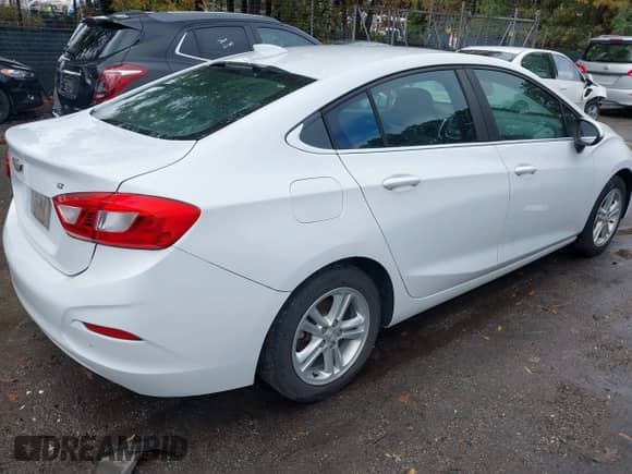 2016 Chevrolet Cruze LT with VIN 1G1BE5SM2G7304805, listed as a IAAI auction lot 43591481 with 179,378 mi miles and . Bid and sale history available at DreamBid. Image 4.