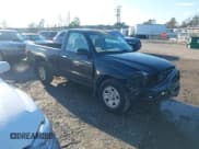 ✅ 2003 Toyota Tacoma • VIN: 5TENL42NX3Z146598 • Lot: 43829316. Listed on IAAI with 223,434 mi. Free auction sales archive from the USA and detailed vehicle history report at DreamBid. Image 1.