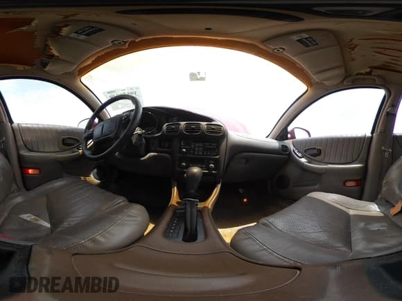 ✅ 1999 Pontiac Grand Prix GTP • VIN: 1G2WR5213XF339219 • Lot: 39839049. Listed on IAAI with 211,594 mi. Free auction sales archive from the USA and detailed vehicle history report at DreamBid. Image 19.