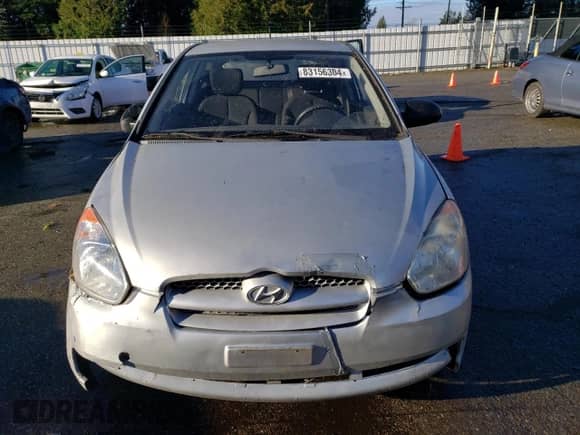 2009 Hyundai Accent Auto GS z VIN KMHCM36C89U142148, wystawiony jako Copart lot #83156304 z przebiegiem 105 534 mil mil oraz Szkoda całkowita • Salvage title. Historia ofert i sprzedaży dostępna na DreamBid. Obrazek 5.