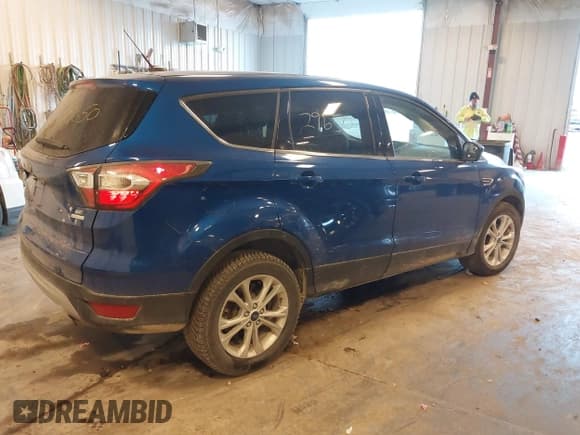 ✅ 2017 Ford Escape SE • VIN: 1FMCU0GD6HUB14787 • Lot: 43629650. Listed on IAAI with 143,286 mi. Free auction sales archive from the USA and detailed vehicle history report at DreamBid. Image 4.