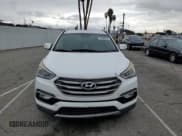✅ 2017 Hyundai Santa Fe 2.4L • VIN: 5NMZU3LB8HH026562 • Лот: 69805812. Опубликован ранее на Copart с пробегом 124 554 миль. Бесплатный доступ к архиву аукционных продаж из США и подробный отчёт об истории автомобиля на DreamBid. Изображение 5.