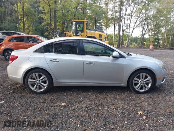 ✅ 2011 Chevrolet Cruze LTZ • VIN: 1G1PH5S94B7194213 • Лот: 43387084. Опубликован ранее на IAAI с пробегом 142 321 миль. Бесплатный доступ к архиву аукционных продаж из США и подробный отчёт об истории автомобиля на DreamBid. Изображение 13.