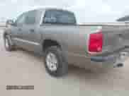 2006 Dodge Dakota SLT with VIN 1D7HE48N16S703072, listed as a IAAI auction lot 42156709 with 102,919 mi miles and . Bid and sale history available at DreamBid. Image 3.