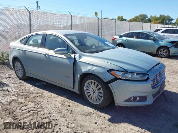 ✅ 2013 Ford Fusion SE Hybrid • VIN: 3FA6P0LU2DR148831 • Лот: 43282206. Опубликован ранее на IAAI с пробегом 160 117 миль. Бесплатный доступ к архиву аукционных продаж из США и подробный отчёт об истории автомобиля на DreamBid. Изображение 1.