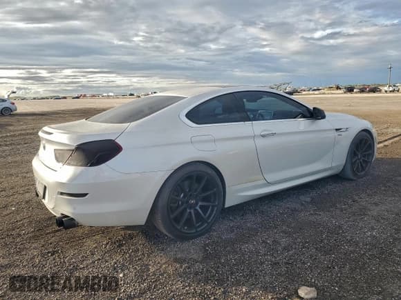 ✅ 2012 BMW 6 Series 650i xDrive • VIN: WBALX5C59CC894531 • Лот: 94411845. Опубликован ранее на Copart с пробегом 137 298 миль. Бесплатный доступ к архиву аукционных продаж из США и подробный отчёт об истории автомобиля на DreamBid. Изображение 3.