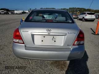 2001 Hyundai Elantra GLS z VIN KMHDN45D81U161742, wystawiony jako Copart lot #79253234 z przebiegiem 107 321 mil mil oraz Nie do naprawy • Non repairable. Historia ofert i sprzedaży dostępna na DreamBid. Obrazek 6.