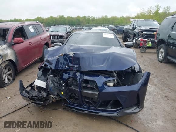 ✅ 2024 BMW M4 Competition xDrive • VIN: WBS43AZ07RCR10248 • Lot: 42196536. Listed on IAAI with 1,718 mi. Free auction sales archive from the USA and detailed vehicle history report at DreamBid. Image 12.