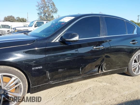 ✅ 2014 Infiniti Q50 Hybrid Sport • VIN: JN1AV7AR1EM701435 • Lot: 41479140. Wystawiony na IAAI z przebiegiem 154 338 mil. Bezpłatny archiwum sprzedaży aukcyjnych z USA i szczegółowy raport historii pojazdu na DreamBid. Zdjęcie 6.