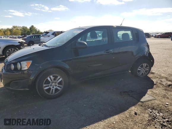 ✅ 2012 Chevrolet Sonic LS • VIN: 1G1JB6SH5C4213911 • Lot: 82407995. Listed on Copart with 214,419 mi. Free auction sales archive from the USA and detailed vehicle history report at DreamBid. Image 1.