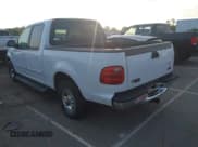 ✅ 2001 Ford F-150 XLT • VIN: 1FTRW07W31KE00138 • Lot: 42827532. Listed on IAAI with 309,413 mi. Free auction sales archive from the USA and detailed vehicle history report at DreamBid. Image 3.