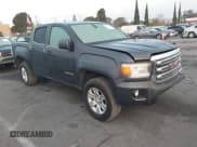 ✅ 2016 GMC Canyon 2WD SLE • VIN: 1GTG5CE30G1301490 • Lot: 41409489. Listed on IAAI with 109,618 mi. Free auction sales archive from the USA and detailed vehicle history report at DreamBid. Image 1.