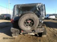 ✅ 2021 Jeep Wrangler Unlimited Sahara • VIN: 1C4HJXEG1MW579887 • Lot: 41299338. Listed on IAAI with 50,707 mi. Free auction sales archive from the USA and detailed vehicle history report at DreamBid. Image 16.