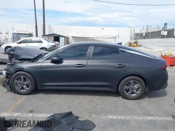 ✅ 2021 Kia K5 LX • VIN: 5XXG24J27MG028107 • Lot: 43247619. Wystawiony na IAAI z przebiegiem 70 981 mil. Bezpłatny archiwum sprzedaży aukcyjnych z USA i szczegółowy raport historii pojazdu na DreamBid. Zdjęcie 14.