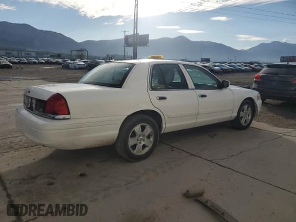✅ 2011 Ford Crown Victoria LX • VIN: 2FABP7EV9BX175018 • Lot: 84757965. Listed on Copart with 160,738 mi. Free auction sales archive from the USA and detailed vehicle history report at DreamBid. Image 3.