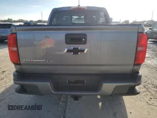 ✅ 2018 Chevrolet Colorado 4WD Z71 • VIN: 1GCGTDEN6J1288071 • Лот: 73642694. Опубликован ранее на Copart с пробегом Не указан. Бесплатный доступ к архиву аукционных продаж из США и подробный отчёт об истории автомобиля на DreamBid. Изображение 6.