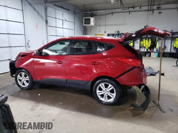 2012 Hyundai Tucson GLS z VIN KM8JU3AC2CU353030, wystawiony jako Copart lot #66072874 z przebiegiem 129 142 mil mil oraz Szkoda całkowita • Salvage title. Historia ofert i sprzedaży dostępna na DreamBid. Obrazek 2.