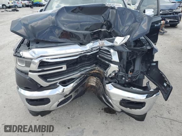 ✅ 2019 Ram 1500 Laramie • VIN: 1C6RRFJG3KN834238 • Lot: 63385444. Listed on Copart with 32,587 mi. Free auction sales archive from the USA and detailed vehicle history report at DreamBid. Image 12.