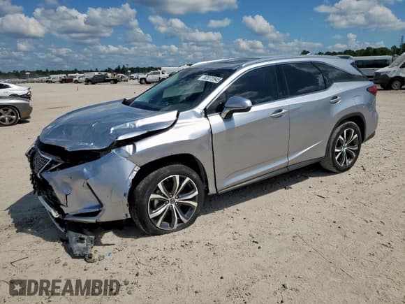 ✅ 2022 Lexus RX 350L • VIN: JTJHZKEA9N2028507 • Lot: 82072945. Wystawiony na Copart z przebiegiem 26 418 mil. Bezpłatny archiwum sprzedaży aukcyjnych z USA i szczegółowy raport historii pojazdu na DreamBid. Zdjęcie 1.