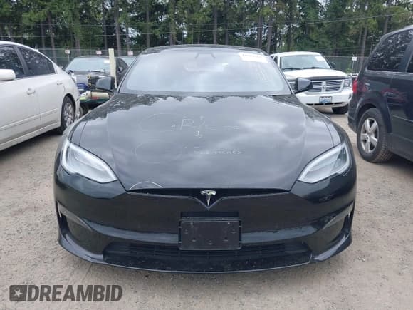 ✅ 2021 Tesla Model S Plaid • VIN: 5YJSA1E62MF447509 • Lot: 42509281. Listed on IAAI with 32,372 mi. Free auction sales archive from the USA and detailed vehicle history report at DreamBid. Image 13.