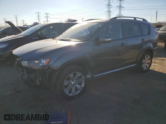 ✅ 2012 Mitsubishi Outlander SE • VIN: JA4JT3AW8CU002750 • Lot: 85421935. Wystawiony na Copart z przebiegiem 141 439 mil. Bezpłatny archiwum sprzedaży aukcyjnych z USA i szczegółowy raport historii pojazdu na DreamBid. Zdjęcie 1.