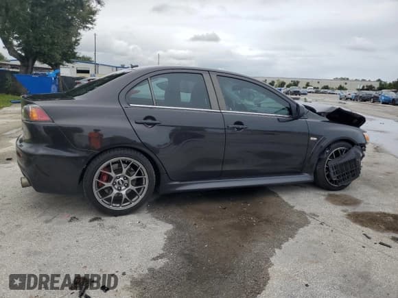 ✅ 2012 Mitsubishi Lancer Evolution MR • VIN: JA32W5FV2CU031365 • Lot: 74764024. Wystawiony na Copart z przebiegiem 127 813 mil. Bezpłatny archiwum sprzedaży aukcyjnych z USA i szczegółowy raport historii pojazdu na DreamBid. Zdjęcie 3.