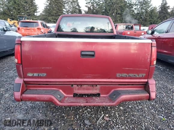 1996 Chevrolet S-10 LS with VIN 1GCCS1948TK167699, listed as a Copart auction lot 85314574 with 157,896 mi miles and Salvage title. Bid and sale history available at DreamBid. Image 6.