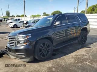 2018 Chevrolet Tahoe LS with VIN 1GNSCAKC8JR360697, listed as a Copart auction lot 80026395 with 85,155 mi miles and Salvage title. Bid and sale history available at DreamBid. Image 1.