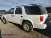2003 Chevrolet Blazer LS z VIN 1GNDT13X33K136937, wystawiony jako Copart lot #80944284 z przebiegiem 163 549 mil mil oraz Szkoda całkowita • Salvage title. Historia ofert i sprzedaży dostępna na DreamBid. Obrazek 2.