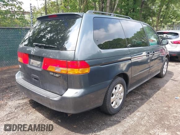 ✅ 2003 Honda Odyssey EX-L • VIN: 5FNRL18013B146020 • Лот: 42933646. Опубликован ранее на IAAI с пробегом 268 243 миль. Бесплатный доступ к архиву аукционных продаж из США и подробный отчёт об истории автомобиля на DreamBid. Изображение 4.