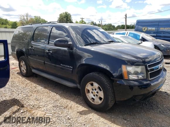 ✅ 2011 Chevrolet Suburban LS • VIN: 1GNSKHE35BR376672 • Lot: 69775825. Listed on Copart with 132,908 mi. Free auction sales archive from the USA and detailed vehicle history report at DreamBid. Image 4.