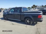 ✅ 2003 Ford F-150 Harley-Davidson • VIN: 1FTRW07373KC44985 • Lot: 58571585. Listed on Copart with 202,249 mi. Free auction sales archive from the USA and detailed vehicle history report at DreamBid. Image 2.