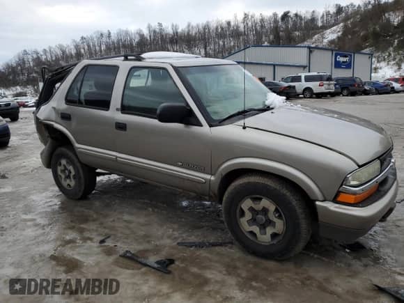 2002 Chevrolet Blazer LS with VIN 1GNDT13W82K211783, listed as a Copart auction lot 41692645 with 244,037 mi miles and Salvage title. Bid and sale history available at DreamBid. Image 4.