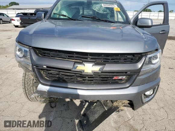 ✅ 2020 Chevrolet Colorado 4WD Z71 • VIN: 1GCGTDEN8L1103795 • Лот: 66598924. Опубликован ранее на Copart с пробегом 65 467 миль. Бесплатный доступ к архиву аукционных продаж из США и подробный отчёт об истории автомобиля на DreamBid. Изображение 11.