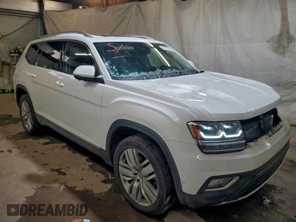 ✅ 2018 Volkswagen Atlas SEL Premium • VIN: 1V2NR2CA7JC551116 • Lot: 94775895. Listed on Copart with 130,519 mi. Free auction sales archive from the USA and detailed vehicle history report at DreamBid. Image 4.