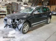 ✅ 2010 Volkswagen Touareg VR6 • VIN: WVGBF7A99AD002591 • Lot: 70624234. Listed on Copart with 154,330 mi. Free auction sales archive from the USA and detailed vehicle history report at DreamBid. Image 1.