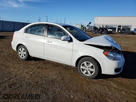 2011 Hyundai Accent GLS z VIN KMHCN4AC5BU607596, wystawiony jako Copart lot #79515184 z przebiegiem 137 475 mil mil oraz Szkoda całkowita • Salvage title. Historia ofert i sprzedaży dostępna na DreamBid. Obrazek 4.
