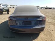 ✅ 2020 Tesla Model 3 Long Range • VIN: 5YJ3E1EB4LF770285 • Лот: 81882125. Опубликован ранее на Copart с пробегом 79 001 миль. Бесплатный доступ к архиву аукционных продаж из США и подробный отчёт об истории автомобиля на DreamBid. Изображение 6.
