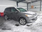 ✅ 2015 Ford Escape Titanium • VIN: 1FMCU0J9XFUB90014 • Lot: 43812041. Listed on IAAI with 80,666 mi. Free auction sales archive from the USA and detailed vehicle history report at DreamBid. Image 1.