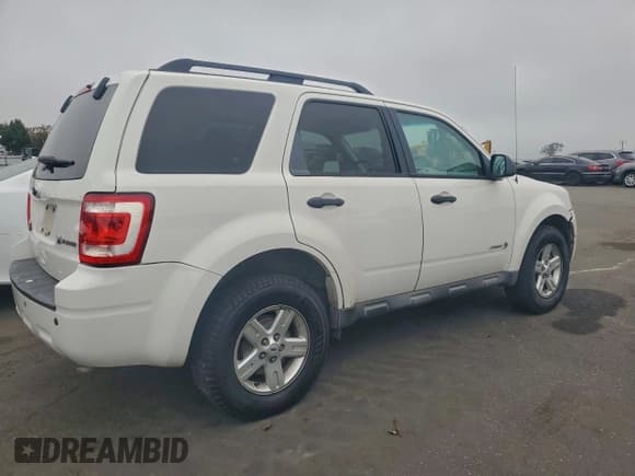✅ 2009 Ford Escape Hybrid • VIN: 1FMCU49379KA48873 • Лот: 94673165. Опубликован ранее на Copart с пробегом 326 276 миль. Бесплатный доступ к архиву аукционных продаж из США и подробный отчёт об истории автомобиля на DreamBid. Изображение 3.