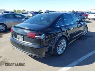 ✅ 2016 Audi A6 Premium • VIN: WAUCFAFC8GN125289 • Lot: 43618552. Wystawiony na IAAI z przebiegiem 70 396 mil. Bezpłatny archiwum sprzedaży aukcyjnych z USA i szczegółowy raport historii pojazdu na DreamBid. Zdjęcie 4.