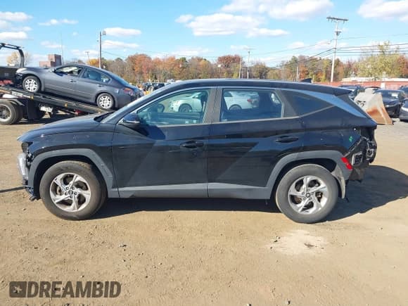 ✅ 2022 Hyundai Tucson SE • VIN: 5NMJACAE0NH053009 • Lot: 43550808. Listed on IAAI with 48,601 mi. Free auction sales archive from the USA and detailed vehicle history report at DreamBid. Image 15.