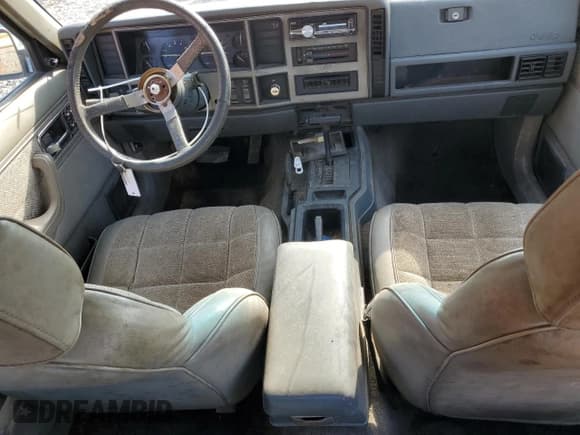 ✅ 1991 Jeep Cherokee • VIN: 1J4FJ58S4ML640883 • Lot: 66574145. Listed on Copart with 340,846 mi. Free auction sales archive from the USA and detailed vehicle history report at DreamBid. Image 8.