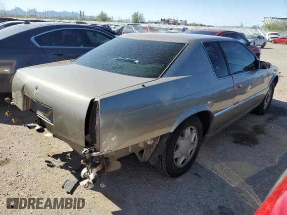 ✅ 2000 Cadillac Eldorado • VIN: 1G6EL12Y7YU135375 • Lot: 69503944. Wystawiony na Copart z przebiegiem 105 703 mil. Bezpłatny archiwum sprzedaży aukcyjnych z USA i szczegółowy raport historii pojazdu na DreamBid. Zdjęcie 3.