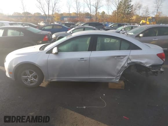 ✅ 2014 Chevrolet Cruze 1LT • VIN: 1G1PC5SB7E7219031 • Lot: 43581337. Listed on IAAI with 150,660 mi. Free auction sales archive from the USA and detailed vehicle history report at DreamBid. Image 14.