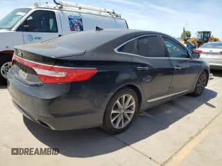 ✅ 2015 Hyundai Azera • VIN: KMHFG4JGXFA483603 • Лот: 56866945. Опубликован ранее на Copart с пробегом 164 009 миль. Бесплатный доступ к архиву аукционных продаж из США и подробный отчёт об истории автомобиля на DreamBid. Изображение 3.