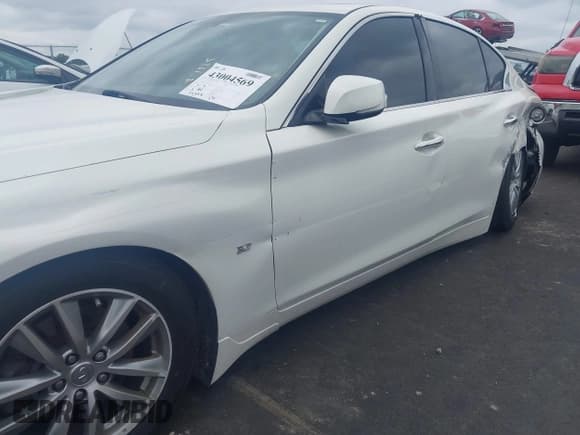 ✅ 2015 Infiniti Q50 Premium • VIN: JN1BV7APXFM355163 • Lot: 43004569. Listed on IAAI with 142,288 mi. Free auction sales archive from the USA and detailed vehicle history report at DreamBid. Image 14.